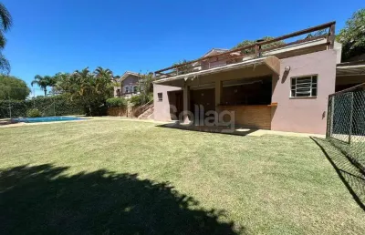 Casa em condomínio à venda térrea com três suítes, piscina e amplo quintal no condomínio marambaia em vinhedo/sp