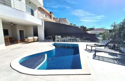 Casa mobiliada com 4 suítes para alugar no condomínio reserva santa isabel i - louveira.