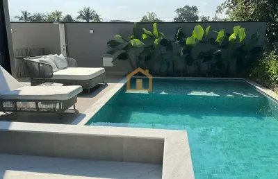 Casa na riviera com 6 suítes, piscina e quintal com churrasqueira