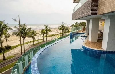 Apartamento 2 dorms prédio fte mar piscina borda infinita jd real praia grande