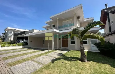 Sobrado com 4 dormitórios à venda, 337 m² por r$ 2.980.000,00 - condomínio residencial jaguary - sã
