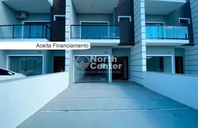 Sobrado geminado n 3 com piscina e churrasqueira no bairro costeira, balneário barra do sul, sc