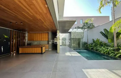 Casa em condomínio fechado à venda, 4 suítes, 5 vagas, condomínio bosque karaíba - uberlândia/mg