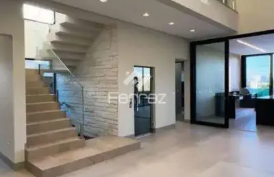 Casa em condomínio fechado à venda, 4 quartos ( sendo 3 suítes), 4 vagas, condomínio tambóre - uberlândia/mg