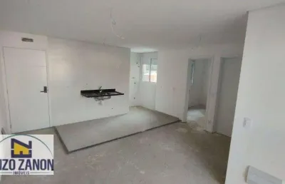 Apartamento com baixo valor de condomínio, prédio com elevador, 2 dormitório sendo um suíte, sala com sacada com churrasqueira a carvão.