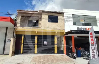 Ponto comercial para locação e venda próximo à praia da costa  com pavimento superior residencial