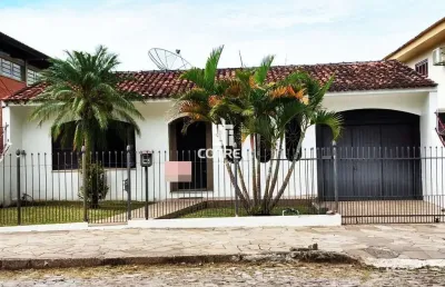 Casa 3 dormitórios 1  suíte  3 vagas de garagem localizada no bairro nsª . srª.