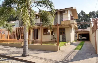 Casa com 4 dormitórios (1) suíte , 4 banheiros e 3 vagas de garagem no bairro sã