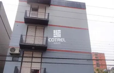 Apartamento central 3 dormitórios sendo 1 suíte e 1 vaga de garagem localizado n