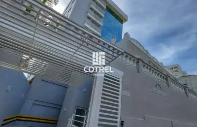 Apartamento central 2 dormitórios sendo 1 suíte e 1 vaga de garagem localizado n