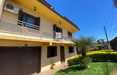 Casa 5 dormitórios sendo 1 suíte e 6 vagas de garagem no bairro camobi localizad