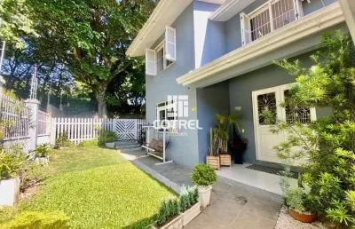 Casa 3 dormitórios e 2 vagas de garagem no bairro nossa senhora de lourdes local