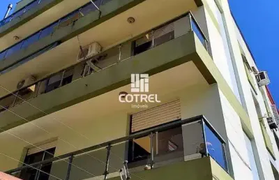Apartamento semimobiliado com 2 dormitórios, suíte e garagem no edifício votron