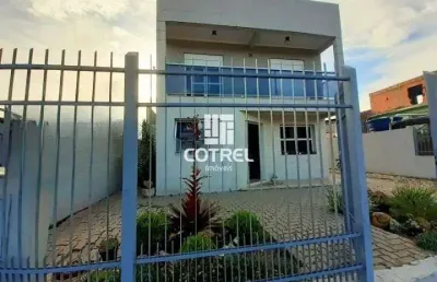 Casa 4 dormitórios 1 suíte 2 vagas de garagem localizada no bairro urlândia na c