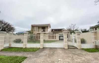 Excelente casa para venda com 4 dormitórios 2 sendo suíte, 2 salas, piscina, 2 v