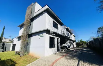 Casa semimobiliada em condomínio fechado com 2 dormitórios e 2 vagas no bairro t
