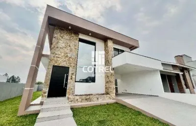 Casa para venda 3 dormitórios sendo suítes, 2 vagas de garagem situada no bairro