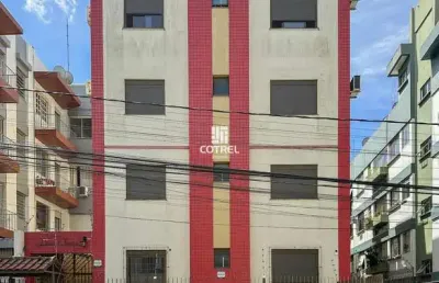 Apartamento com 3 dormitórios, suíte e garagem no bairro centro em santa maria/r