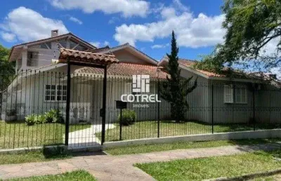 Casa para venda 4 dormitórios sendo 2 suítes, piscina situada no bairro camobi n