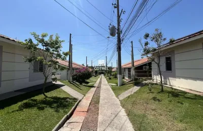 Casa semimobiliada 3 dormitórios sendo 1 suíte, localizada no condomínio fechado