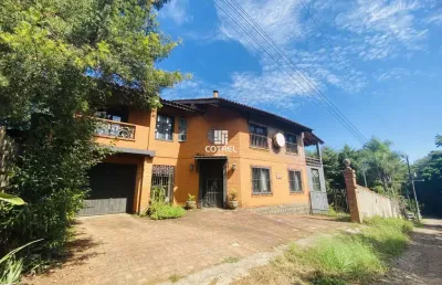 Casa à venda 3 dormitórios sendo 1 suíte, sacada, lareira e 1 vaga de garagem si