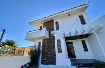 Casa para locação e à venda 3 dormitórios sendo 1 suíte, 4 vagas de garagem, sit