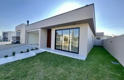 Casa nova em condomínio fechado com 3 dormitórios, suíte e 2 vagas de garagem