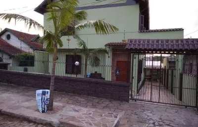 Casa com 3 quartos à venda na Rua Oscar Tollens, Medianeira, Porto Alegre