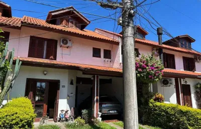 Casa com 3 quartos à venda na Avenida Eduardo Prado, Cavalhada, Porto Alegre