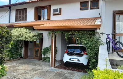 Casa com 3 quartos à venda na Avenida Eduardo Prado, Cavalhada, Porto Alegre