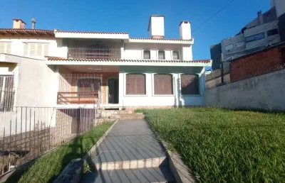 Casa com 4 quartos à venda na Rua Jaguari, Cristal, Porto Alegre