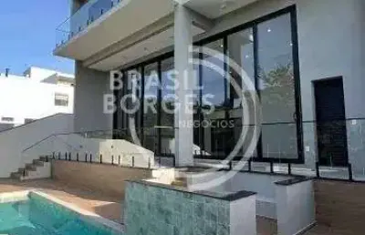 Casa de condomínio com 3 suítes, 303m² - alphaville nova esplanada 4