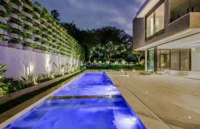 Alphaville residencial dois, barueri - sp. casa à venda na alameda colômbia, 910 m², 5 suítes, piscina, área gourmet, academia e 10 vagas no subsolo