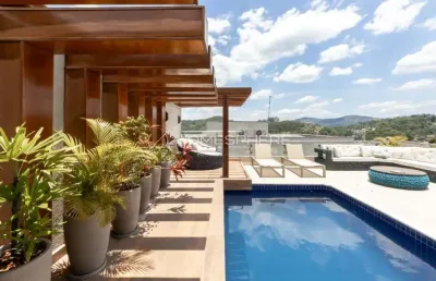Casa de condomínio com 464 m², 4 suítes , piscina e studio acústico