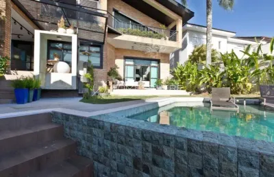 Casa de condomínio com 540 m², 4 quartos sendo 4 suítes à venda no bairro alphaville.