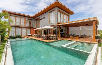 Casa residencial à venda em mata de são joão - praia do forte,332m2,5 suítes,7banheiros,4vagas de garagem, piscina, mobiliado,jardim, espaço gourmet.