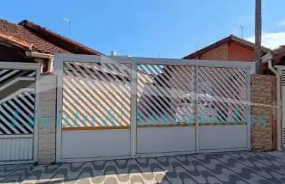 Casa à venda em praia grande-sp, bairro real: 2 quartos, 1 suíte, 1 sala, 2 banheiros, 2 vagas de garagem, 100m² de área.