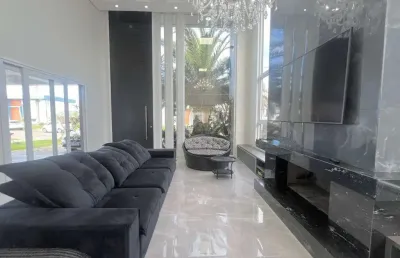 Casa em condomínio fechado com 4 quartos à venda na rua onório germano, 2009, araça, capão da canoa, 200 m2 por r$ 1.590.000