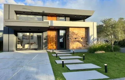Casa em condomínio fechado com 3 quartos à venda na rua onório germano, 2009, araça, capão da canoa, 180 m2 por r$ 1.850.000