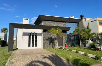Casa em condomínio fechado com 3 quartos à venda na rua onório germano, 2009, araça, capão da canoa por r$ 1.200.000