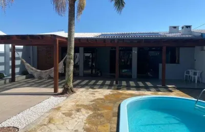 Casa com 4 quartos à venda na rua carlos trindade, e86, araça, capão da canoa por r$ 930.000