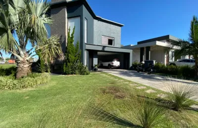 Casa em condomínio fechado com 4 quartos à venda na rua onório germano, 2009, araça, capão da canoa por r$ 2.300.000