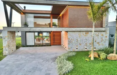 Casa em condomínio fechado com 5 quartos à venda na rua rio jacuí, 1331, atlântida, xangri-lá por r$ 5.900.000