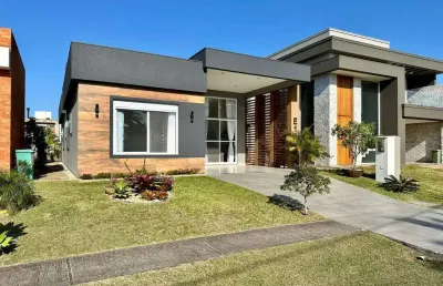 Casa em condomínio fechado com 4 quartos à venda na estrada do mar, 33, parque antártica, capão da canoa, 192 m2 por r$ 1.890.000