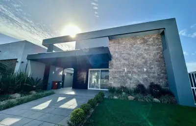 Casa em condomínio fechado com 4 quartos à venda na estrada do mar, 33, parque antártica, capão da canoa por r$ 2.490.000
