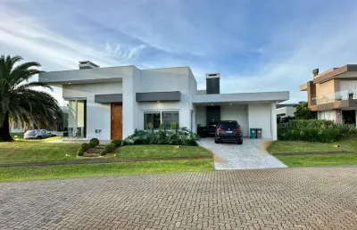 Casa em condomínio fechado com 4 quartos à venda na estrada do mar, 33, parque antártica, capão da canoa por r$ 2.500.000