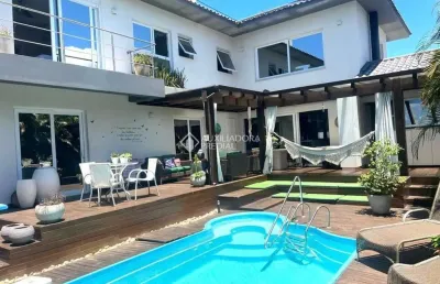 Casa em condomínio fechado com 4 quartos para alugar na rodovia doutor antônio luiz moura gonzaga, 3825, rio tavares, florianópolis, 340 m2 por r$ 20.000