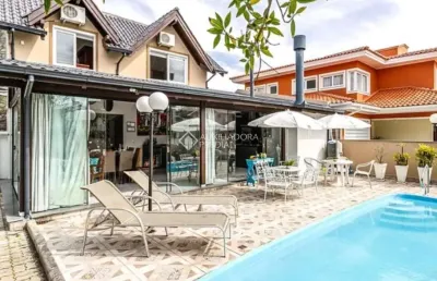 Casa com 5 quartos para alugar na rua das guarajubas, 30, jurerê internacional, florianópolis, 500 m2 por r$ 30.000
