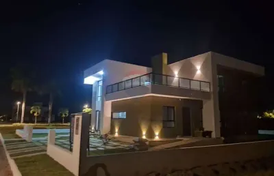 'luxo e segurança em uma casa recem construida com 04 suites em aldeia'