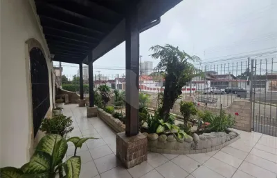 Casa com 3 quartos à venda na Vitório Morbim, Vila Caiçara, Praia Grande